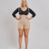BodyAid boy leg bodysuit in beige with front zip. Surgical grade compression ideal for all abdominal and fat transfer procedures. Featured with BodyAid arm compress crop in black.