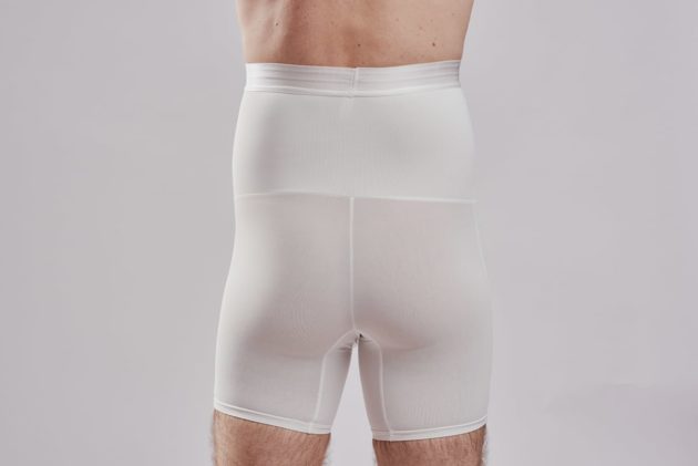 BodyAid male white high waist shaper shorts. Double layer abdominal compression. Rear view.