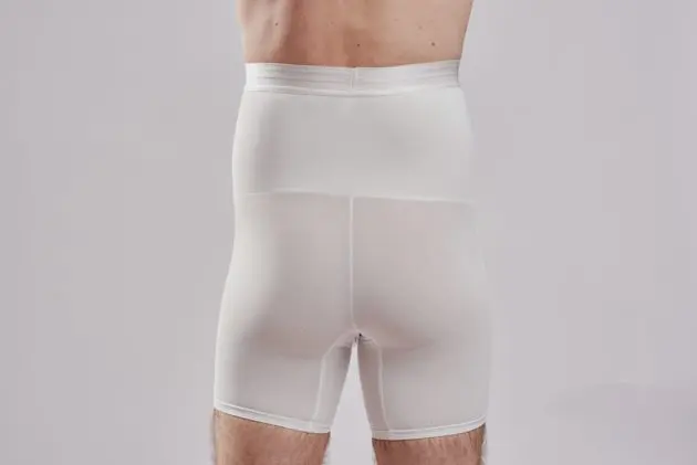 BodyAid male white high waist shaper shorts. Double layer abdominal compression. Rear view.