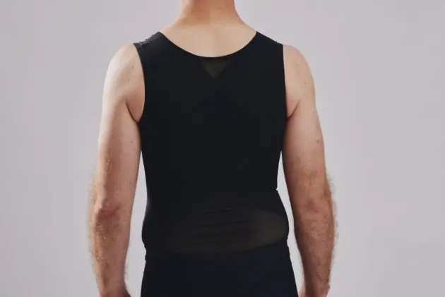 BodyAid male body slimmer in black for compression to the entire torso. Strategic support bands for better posture. Rear view.