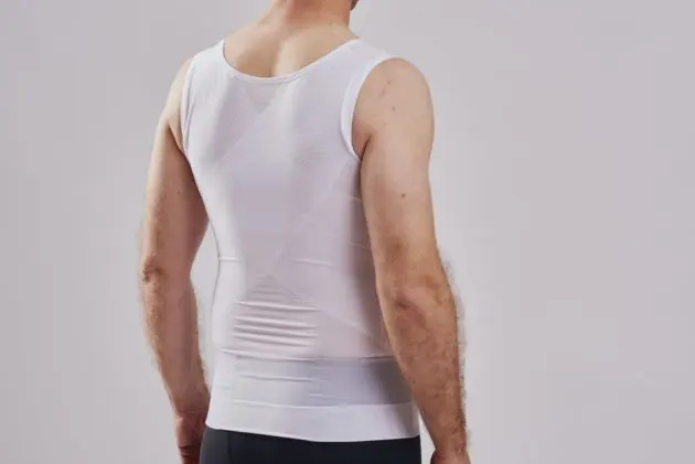 BodyAid male body slimmer in white for compression to the entire torso. Strategic support bands for better posture. Rear view.