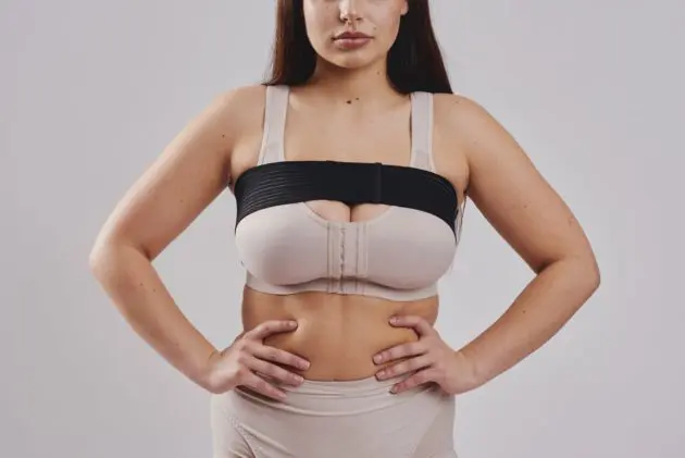 BodyAid Post breast augmentation black self-adjusting comfort stabilizer band for implant positing and stability. Leonisa posture bra in beige.