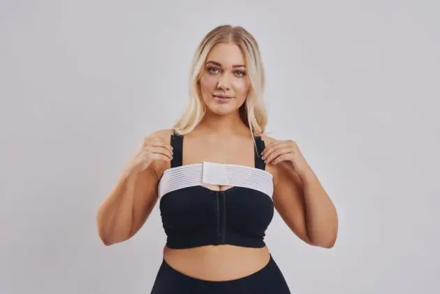 Clearpoint Medical Adjustable white stabilizer band for after breast augmentation. BodyAid arm compress crop in beige with 3/4 sleeves.