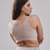 Leonisa posture corrector bra in beige with strategic back support bands for all day comfort wear.