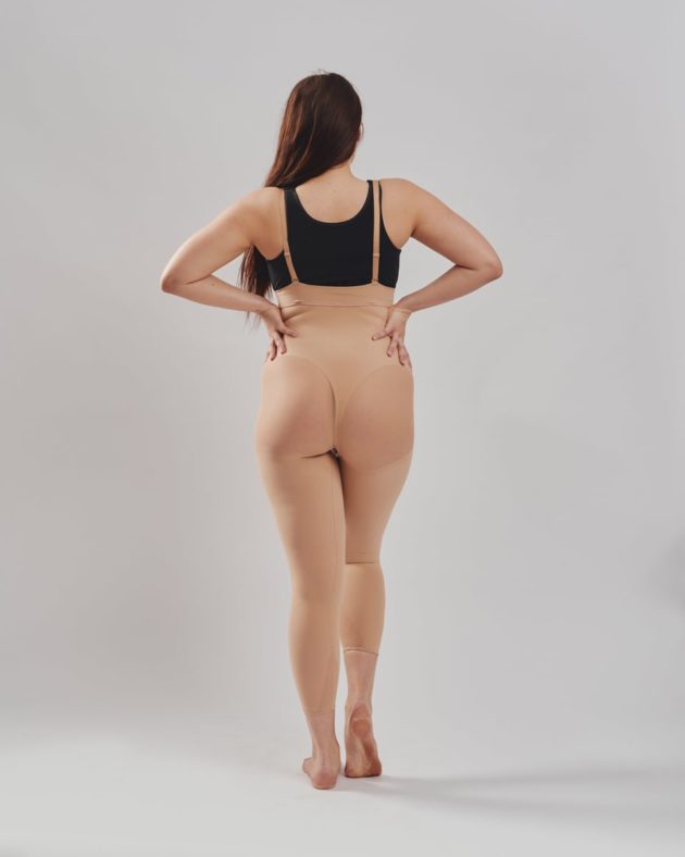 Leonisa Invisible full body shaper with shoulder straps in beige. BodyAid stabilizer bra in black. Rear view.