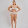 Increase your curves with Leonisa instant butt lift panties. Leonisa posture bra with criss-cross band in beige.